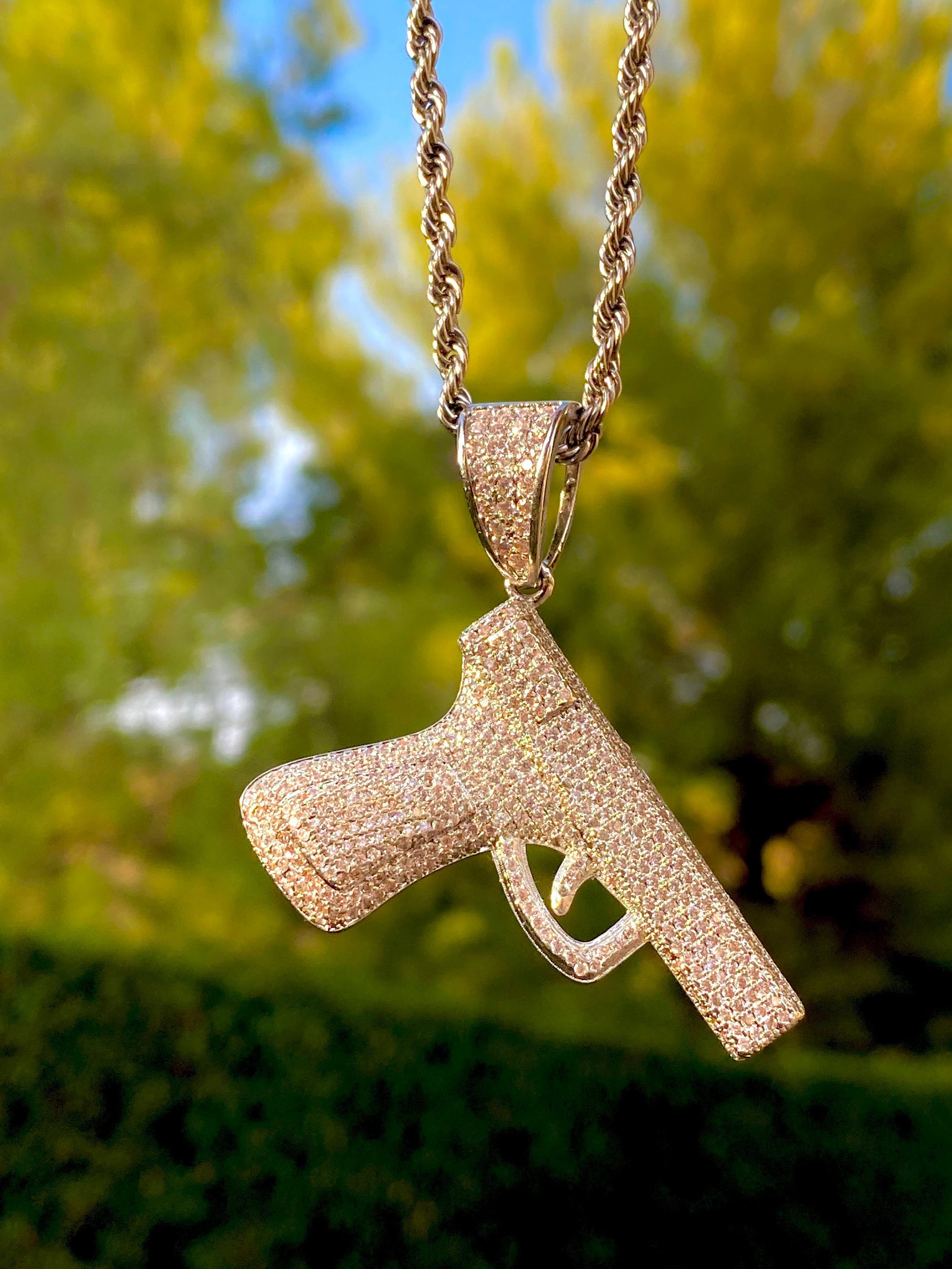 Uzi pendant 2024