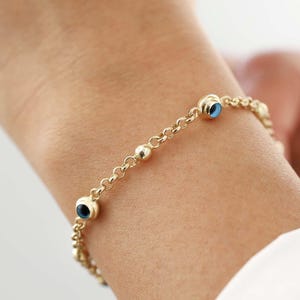14k guldarmband med onda ögon: Rolo Chain Protection Armband