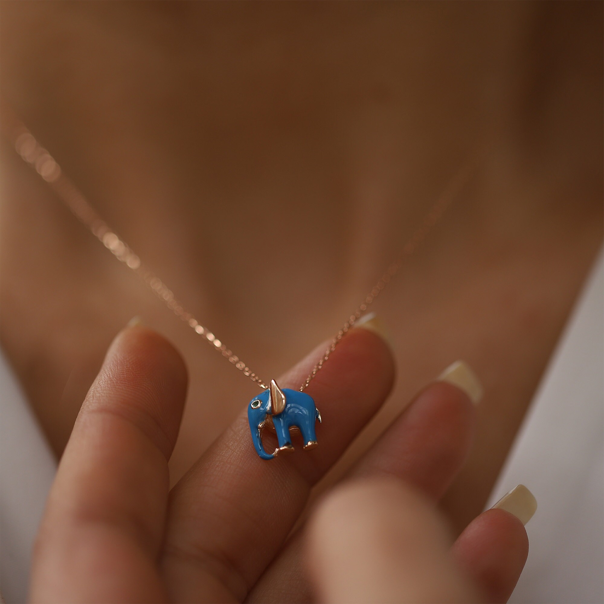 Blue elephant necklace deals