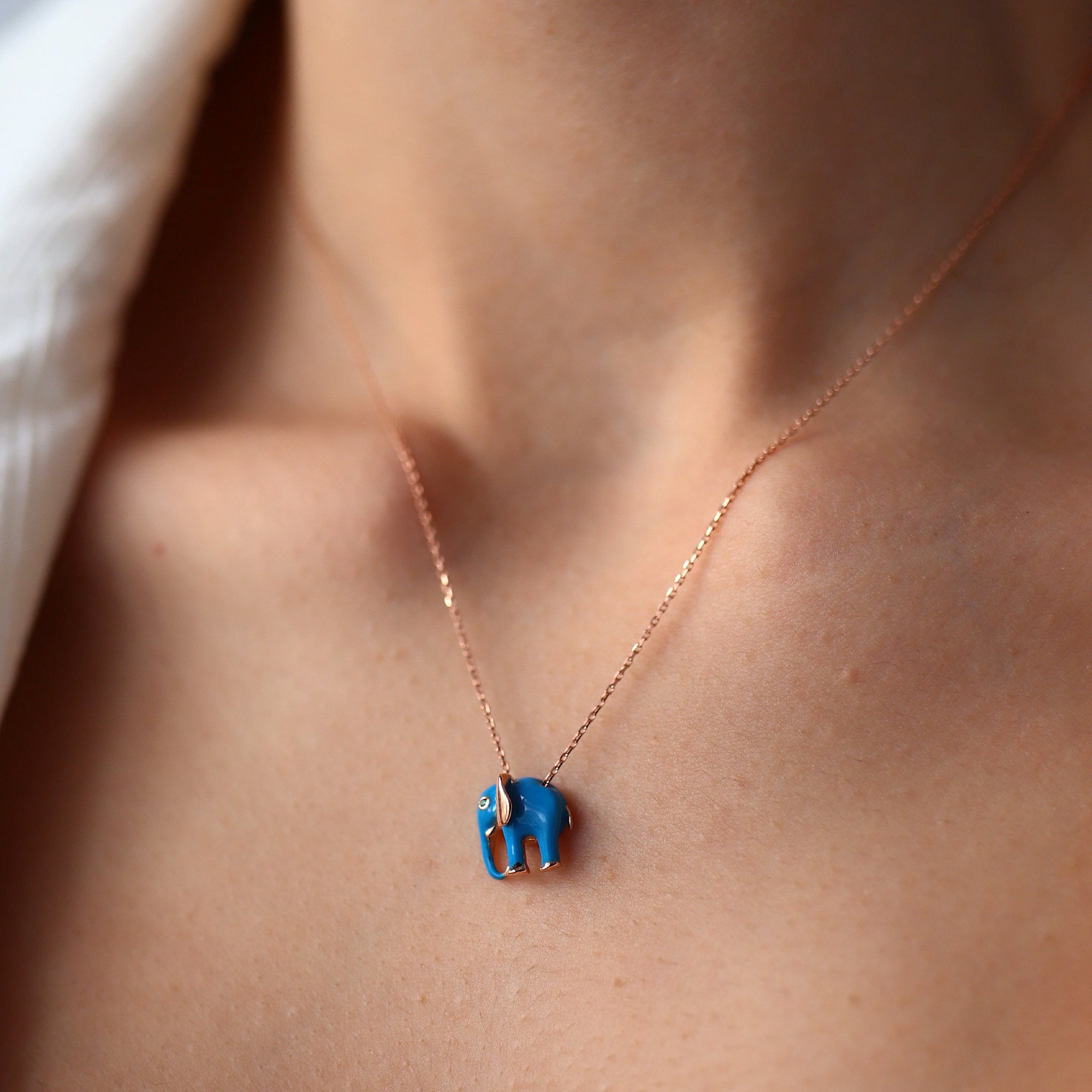 Blue elephant best sale necklace