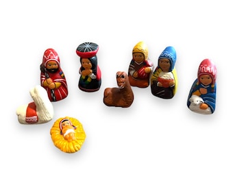 May include: A nativity scene set with figurines of the three wise men, Mary, Joseph, baby Jesus, a camel, and a llama. The figurines are hand-painted in bright colors and have a traditional folk art style.