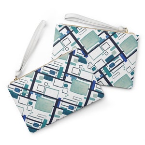 May include: Two white zippered pouches with a geometric pattern of blue, green, and black squares and rectangles on a white background. The pouches have white straps.