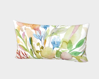 May include: A rectangular pillow with a watercolor design of colorful flowers and leaves on a white background.
