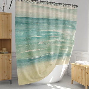 May include: A watercolor-style shower curtain featuring a blue and green ocean scene with white waves. The curtain has a light beige background.