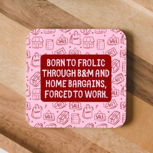 May include: A square coaster with a light pink background featuring a repeating pattern of dark red shopping icons, including bags, storefronts, and sale tags. A dark red rectangular centre contains the text: BORN TO FROLIC THROUGH B&M AND HOME BARGAINS, FORCED TO WORK.