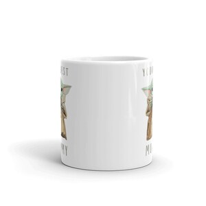 May include: White ceramic mug with a green alien character on each side. The text on the mug reads "You're my best" and "You're my best".