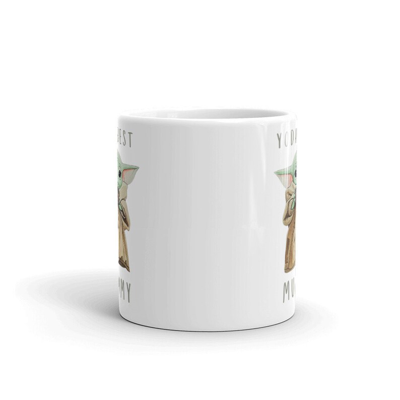 May include: White ceramic mug with a green alien character on each side. The text on the mug reads "You're my best" and "You're my best".