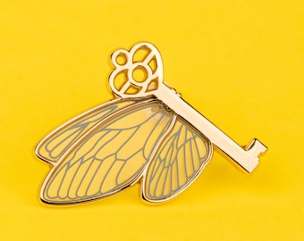 Flying Key (Side) Enamel Pin