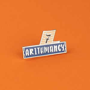 Pin de esmalte de libro de aritmética