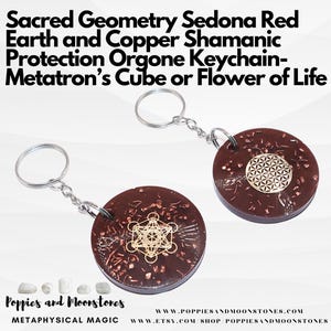 May include: Two red, copper, and gold orgone keychain pendants with a silver key ring. One pendant features the Flower of Life symbol and the other features Metatron's Cube. The pendants are made with sacred geometry and are said to provide protection.  "Poppies and Moonstones Metaphysical Magic" and the website address are printed on the white background.