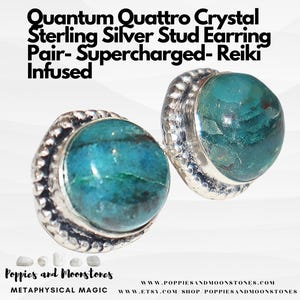 May include: A pair of round Quantum Quattro crystal stud earrings set in sterling silver with a beaded border. The text reads: Quantum Quattro Crystal Sterling Silver Stud Earring Pair- Supercharged- Reiki Infused. Poppies and Moonstones Metaphysical Magic.