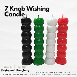 May include: Four 7-knob wishing candles in black, green, white, and red. The candles are arranged in a row from left to right. The text "7 Knob Wishing Candle" is at the top of the image.