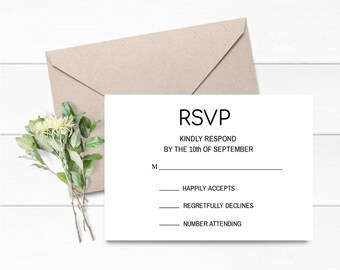May include: A white RSVP card with black text. The text reads "RSVP", "Kindly Respond", "By the 10th of September", "Happily Accepts", "Regretfully Declines", and "Number Attending".