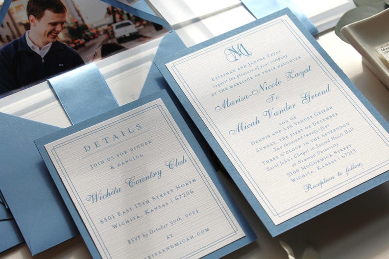 Close up of the Invitation and details card with Monogram