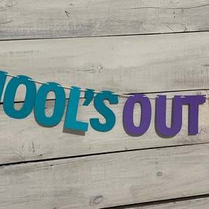 May include: A colourful banner with the text "School's Out For" in blue, purple and yellow letters.