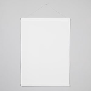 May include: A white poster frame with a string hanging from a hook on a white wall.