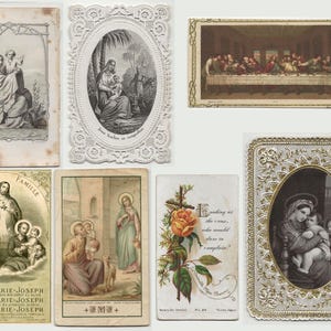 May include: A collection of vintage religious cards featuring illustrations of biblical scenes and figures. The cards depict the Holy Family, Jesus, and other religious imagery. Some cards have ornate borders and text.
