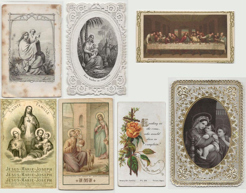 May include: A collection of vintage religious cards featuring illustrations of biblical scenes and figures. The cards depict the Holy Family, Jesus, and other religious imagery. Some cards have ornate borders and text.