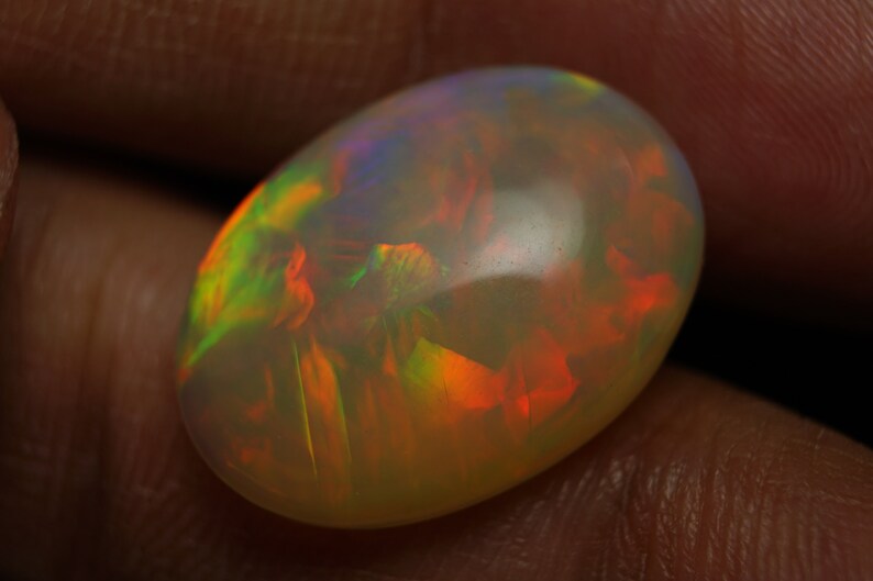 Very Gorgeous 8.20 Carat Multi Fire Ethopian Opal best For All Type Jewelry 19X14X6 MM Multi Flashy Fire Pear Shape Cabochon Ethopian opal