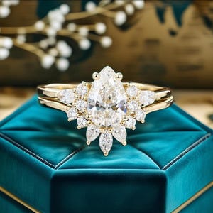 Pear Moissanite Engagement Ring Set: Vintage Leaf Bridal Jewelry