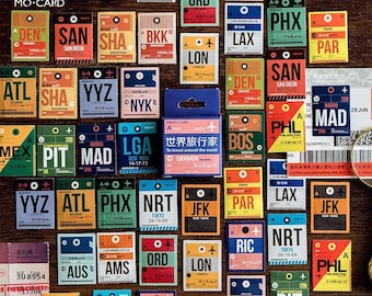 May include: A set of colorful travel stickers featuring airport codes and destinations. The stickers are rectangular and have a vintage travel theme. The stickers include destinations such as New York, London, Tokyo, Paris, and Madrid.