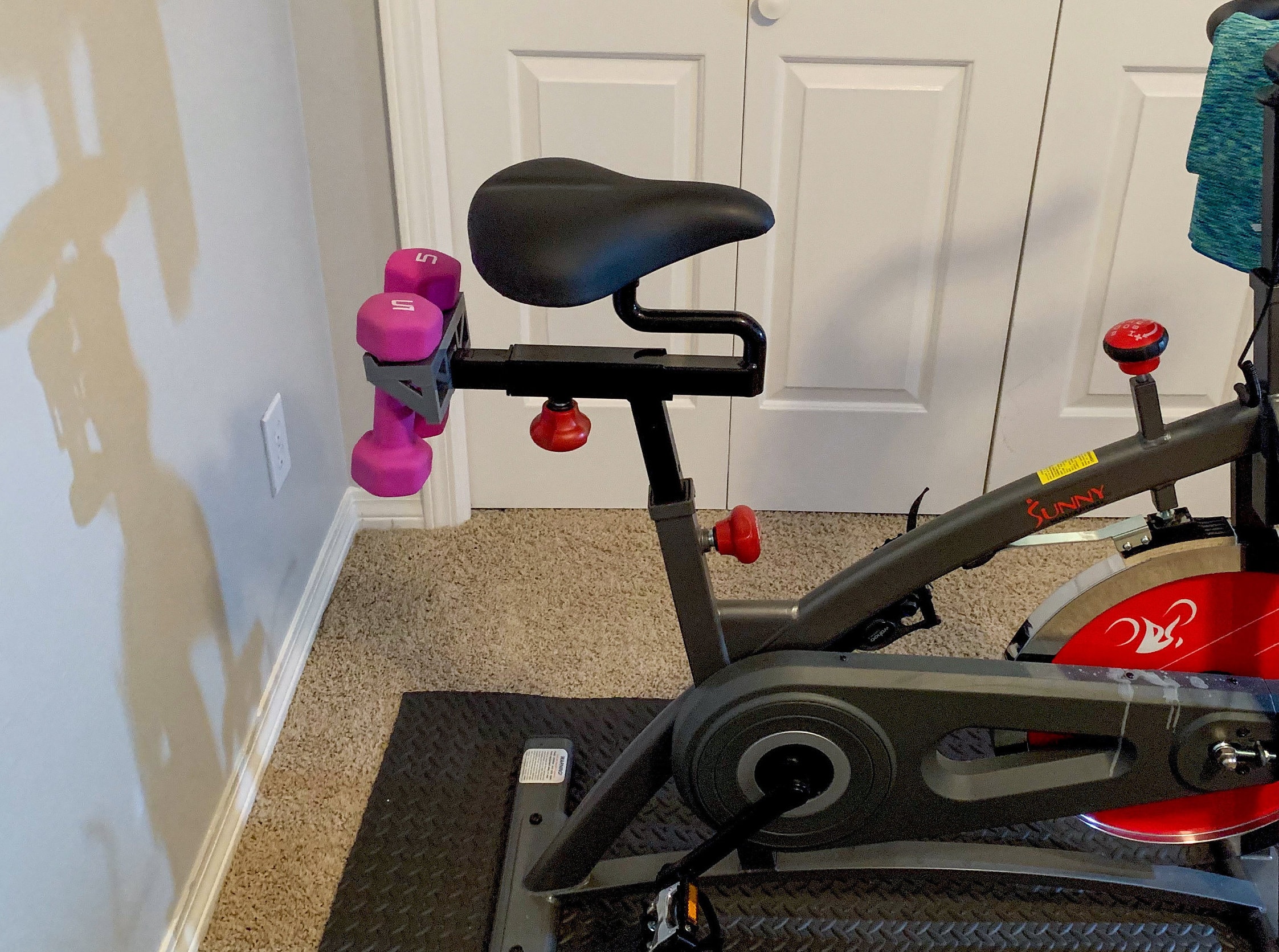 Sunny spin bike weight holder hotsell