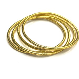 Thin Buddhist gold bangle bracelet , Kumlai mantra bracelet , gold leaf bracelet