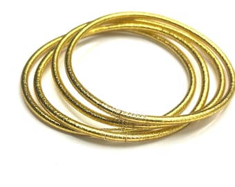 Thin Buddhist gold bangle bracelet , Kumlai mantra bracelet , gold leaf bracelet
