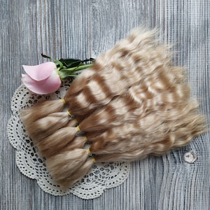 Doll hair. Made from natural Angora goat hair. Perfectly suitable as a hair for dolls. Mohair doll hair is also great for making doll wigs.