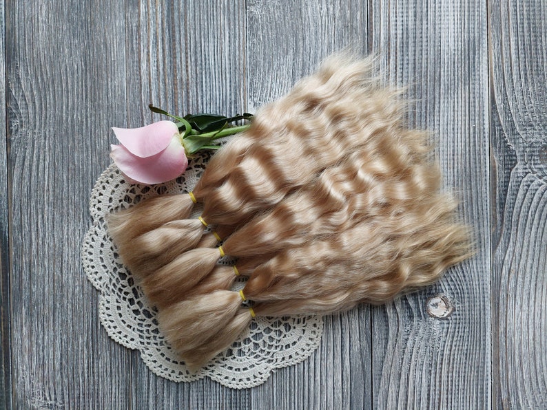 Doll hair. Made from natural Angora goat hair. Perfectly suitable as a hair for dolls. Mohair doll hair is also great for making doll wigs.