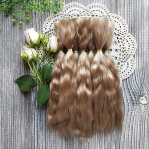 Doll hair. Made from natural Angora goat hair. Perfectly suitable as a hair for dolls. Mohair doll hair is also great for making doll wigs.