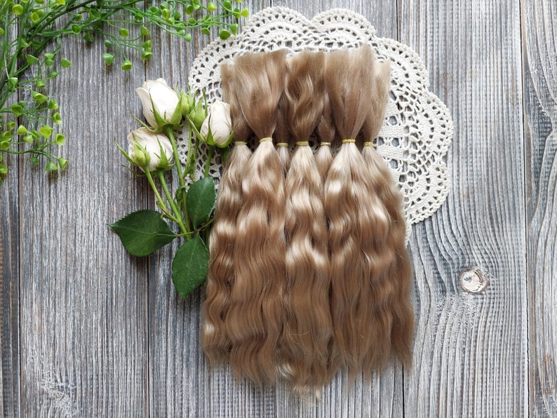 Doll hair. Made from natural Angora goat hair. Perfectly suitable as a hair for dolls. Mohair doll hair is also great for making doll wigs.