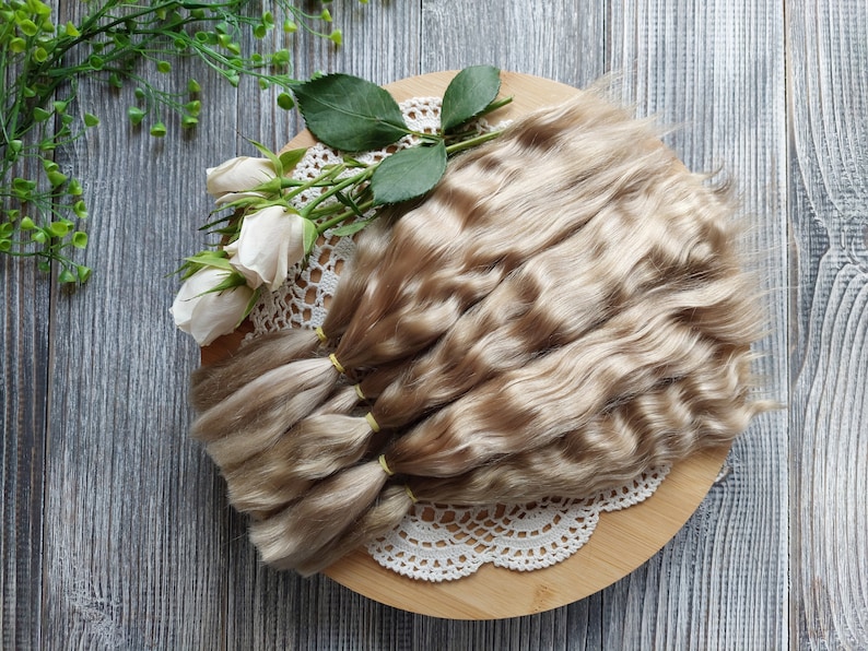 Doll hair. Made from natural Angora goat hair. Perfectly suitable as a hair for dolls. Mohair doll hair is also great for making doll wigs.