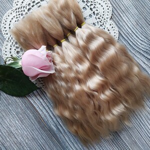 Doll hair. Made from natural Angora goat hair. Perfectly suitable as a hair for dolls. Mohair doll hair is also great for making doll wigs.