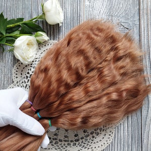 Doll hair. Made from natural Angora goat hair. Perfectly suitable as a hair for dolls. Mohair doll hair is also great for making doll wigs.
