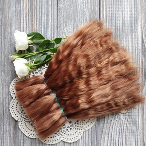 Doll hair. Made from natural Angora goat hair. Perfectly suitable as a hair for dolls. Mohair doll hair is also great for making doll wigs.