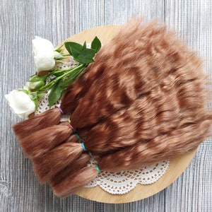 Doll hair. Made from natural Angora goat hair. Perfectly suitable as a hair for dolls. Mohair doll hair is also great for making doll wigs.