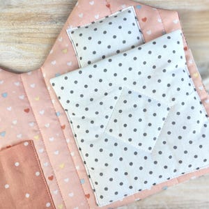 Detail of fabric dollhouse roof and door, handmade textile doll house sewing pattern