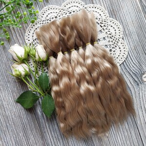 Doll hair. Made from natural Angora goat hair. Perfectly suitable as a hair for dolls. Mohair doll hair is also great for making doll wigs.