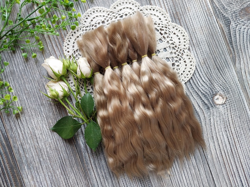Doll hair. Made from natural Angora goat hair. Perfectly suitable as a hair for dolls. Mohair doll hair is also great for making doll wigs.