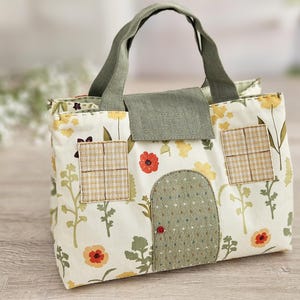 Mini fabric doll bag with handles, handmade dollhouse carrier, side angle view
