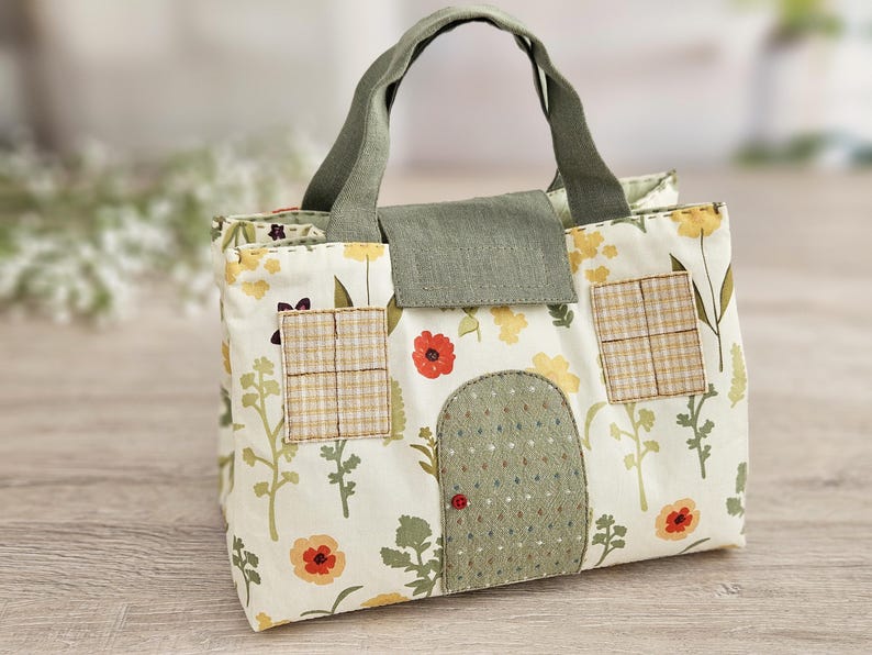 Mini fabric doll bag with handles, handmade dollhouse carrier, side angle view
