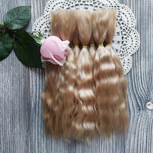 Doll hair. Made from natural Angora goat hair. Perfectly suitable as a hair for dolls. Mohair doll hair is also great for making doll wigs.