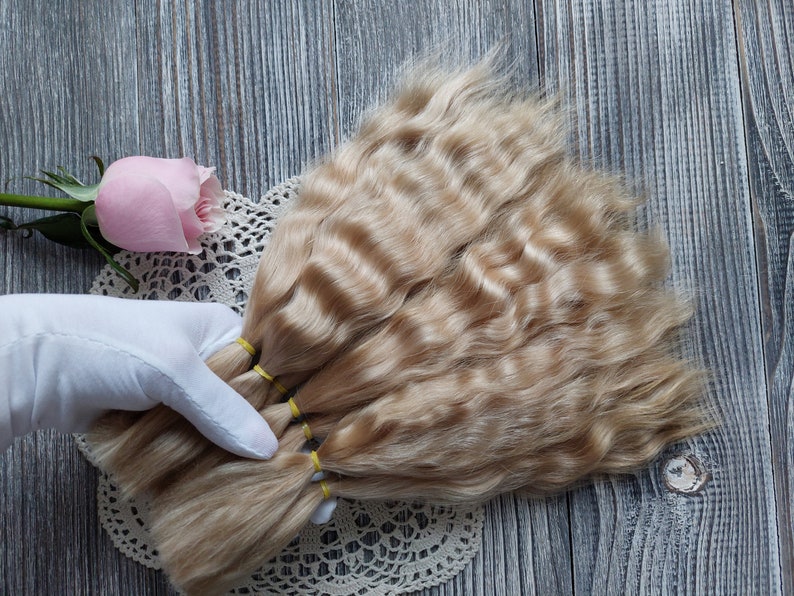 Doll hair. Made from natural Angora goat hair. Perfectly suitable as a hair for dolls. Mohair doll hair is also great for making doll wigs.