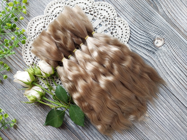 Doll hair. Made from natural Angora goat hair. Perfectly suitable as a hair for dolls. Mohair doll hair is also great for making doll wigs.