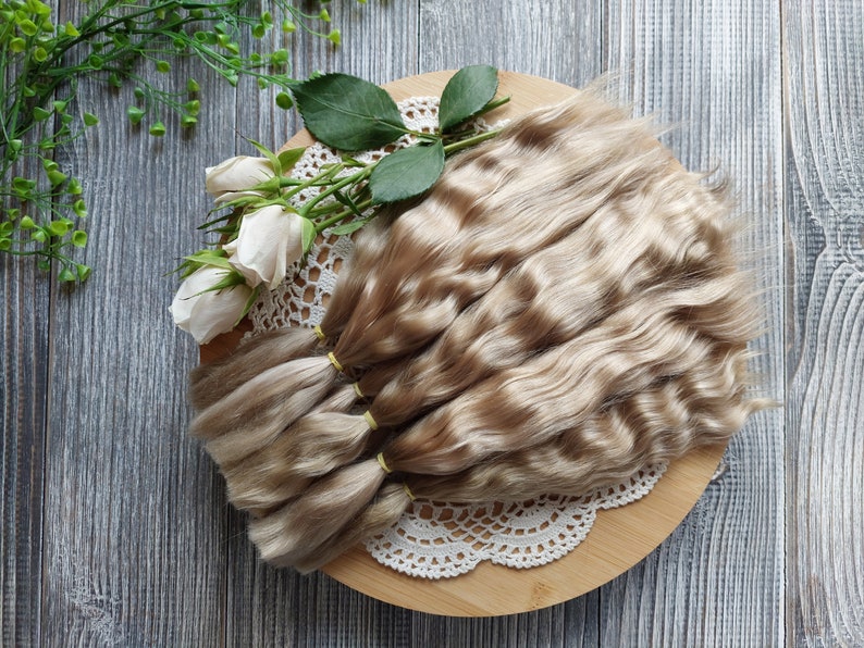 Doll hair. Made from natural Angora goat hair. Perfectly suitable as a hair for dolls. Mohair doll hair is also great for making doll wigs.