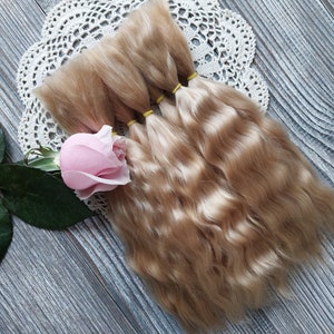Doll hair. Made from natural Angora goat hair. Perfectly suitable as a hair for dolls. Mohair doll hair is also great for making doll wigs.