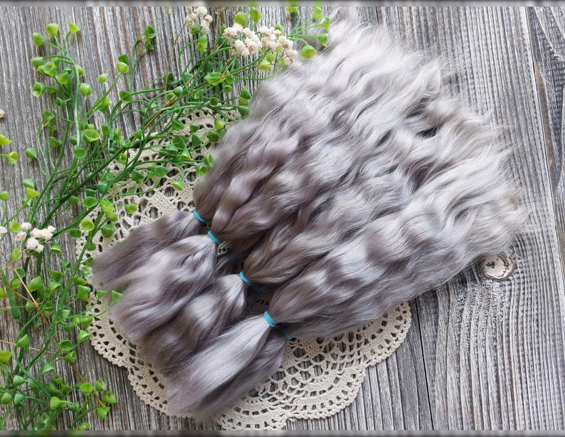 Curly hand dyed mohair doll hair closeup