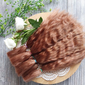 Doll hair. Made from natural Angora goat hair. Perfectly suitable as a hair for dolls. Mohair doll hair is also great for making doll wigs.
