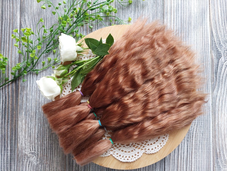 Doll hair. Made from natural Angora goat hair. Perfectly suitable as a hair for dolls. Mohair doll hair is also great for making doll wigs.